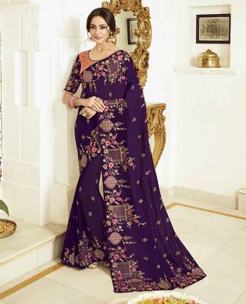 Look Attractive Wearing This Designer Saree In Purple Color Paired with Peach And Purple Colored blouse. This Saree Is Fabricated On Vichitra Silk Paired With Art Silk Fabricated Blouse. Its Pretty Embroidery, Colors And Rich Fabric Will Earn You Lots Of Compliments From Onlookers. 