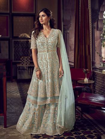 Flaunt Your Rich And Elegant Taste In This Very Pretty Heavy Designer Sharara Suit In Baby Blue Color. Its Top, Bottom and Dupatta Are Fabricated On Net Beautified With Attractive Detailed Embroidery. Buy Now.