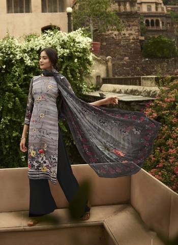 Simple And Elegant Looking Printed Dress Material Is Here In Grey And Black Color. This Suit Is Crepe Based Paired With Georgette Fabricated Dupatta. It Is Beautified With Digital Prints And Embroidery.