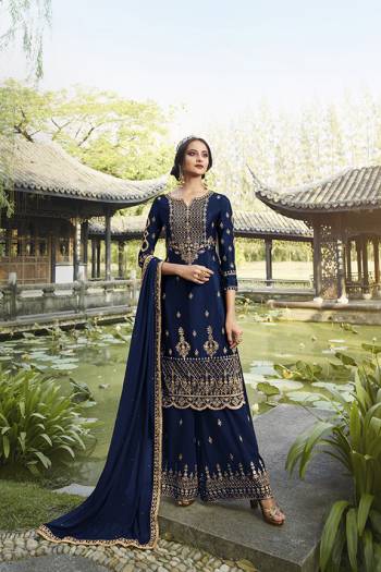 Enhance Your Personality Wearing This Heavy Designer Straight suit In Navy Blue Color. It Pretty Embroidered Top, Bottom and Dupatta Are Fabricated On Georgette Which Is Light In Weight And Easy To Carry Throughout The Gala. 