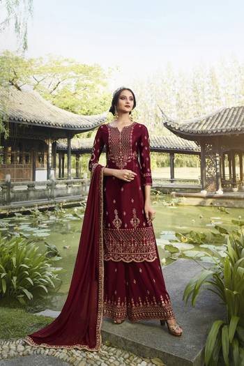 Enhance Your Personality Wearing This Heavy Designer Straight suit In Maroon Color. It Pretty Embroidered Top, Bottom and Dupatta Are Fabricated On Georgette Which Is Light In Weight And Easy To Carry Throughout The Gala. 