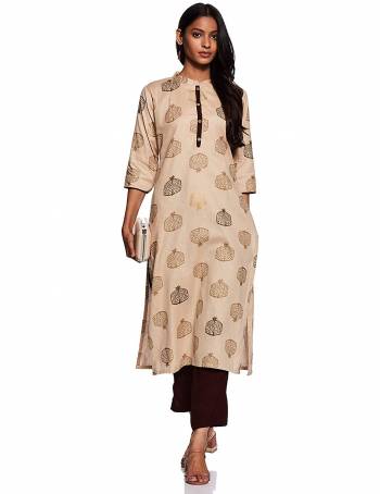 Here Is A Beautiful Readymade Pair Of Kurti With Bottom In Light Beige & Brown Color. This Kurti Is Fabricated On Cotton Beautified With Prints Paired with Rayon Fabricated Plain Bottom. 