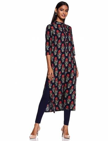 For Your Casual Wear, Grab This Readymade Straight Kurti In Navy Blue Color Fabricated On Rayon Beautified With Floral Prints. 