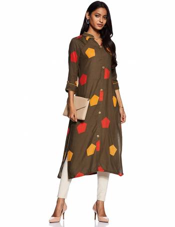 Add This Readymade Kurti To Your Wardrobe In Olive Brown Color Fabricated On Rayon Beautified With Prints. It Is Light In Weight And Easy To Carry All Day Long. 