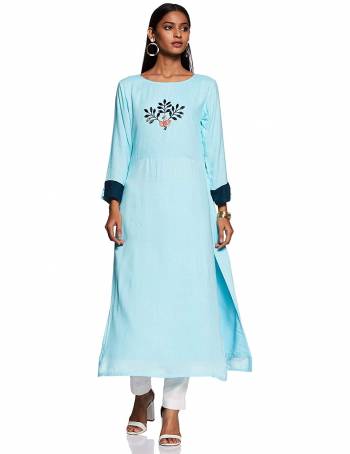 For Your Casual Or Semi-Casual Wear, Grab This Readymade Straight Kurti In Sky Blue Color Fabricated On Rayon Beautified With Thread Work. 