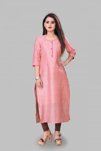 Add This Pretty Readymade Kurti To Your Wardrobe In Light Pink Color Fabricated On Cotton Silk. This Straight Kurti Is Light In Weight And Available In All Regular Sizes. 