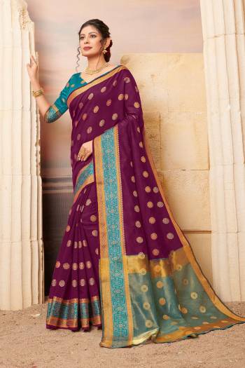 Add This  Beautiful And Attractive Looking Designer Saree In Purple Color Paired with Contrasting Blue Colored Blouse. This Saree and Blouse Are Fabricated On Cotton Beautified With Weave. 