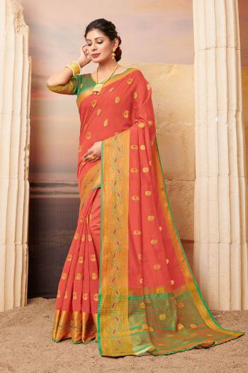 Add This  Beautiful And Attractive Looking Designer Saree In Peach Color Paired with Contrasting Green Colored Blouse. This Saree and Blouse Are Fabricated On Cotton Beautified With Weave. 