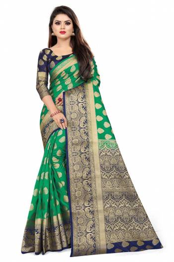 For A Proper Traditional Look, Grab This Heavy Weaved Silk Based Designer Saree In Sea Green Color Paired with Navy Blue Colored blouse. This Saree and Blouse Are Fabricated On Art Silk Which Gives A Rich Look To Your Personality. 