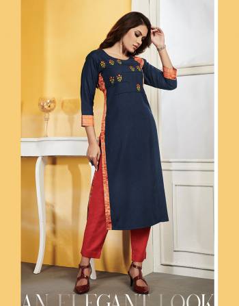 Add This Readymade Kurti To Your Wardrobe In Navy Blue Color Fabricated On Rayon Slub. It Can Be Paired With Same Or Contrasting Colored Bottom. Buy Now.