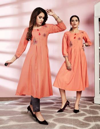 Look Pretty In This Pretty Readymade Kurti In Peach Color Fabricated On Rayon. This Kurti Is Suitable For Semi-Casual Wear And Available In All Regular Sizes. 