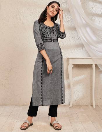 Add This Readymade Kurti To Your Wardrobe In Dark Grey Color Fabricated On South Cotton. It Can Be Paired With Same Or Contrasting Colored Bottom. Buy Now.