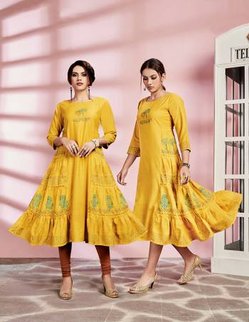 Look Pretty In This Pretty Readymade Kurti In Yellow Color Fabricated On Rayon. This Kurti Is Suitable For Semi-Casual Wear And Available In All Regular Sizes. 