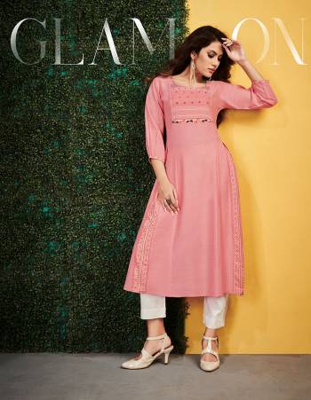 Add This Readymade Kurti To Your Wardrobe In Pink Color Fabricated On Rayon. It Can Be Paired With Same Or Contrasting Colored Bottom. Buy Now.