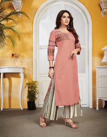 Grab This Pretty Readymade Kurti For Your Casual Or Semi-Casual Wear In Dusty Pink Color Fabricated On Linen. This Pretty Kurti Is Light Weight, Durable And Easy To Carry All Day Long. 