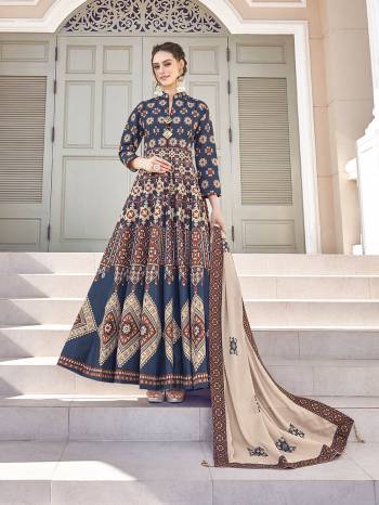 Grab This Very Beautiful Designer Readymade Suit In Navy Blue And Brown Color. Its Lovely Printed Top Is Soft Silk Based Paired With Cotton Leggings And Soft Muslin Fabricated Dupatta. This Readymade Suit Is Beautified With Prints All Over. Also It Is Available In All Regular Sizes. Buy Now.