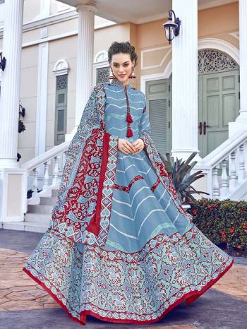 Look Pretty In This Lovely Readymade Designer Floor Length Suit In Sky Blue Color. Its Top Is Fabricated On Soft Silk Paired With Cotton Leggings And Soft Muslin Fabricated Dupatta. Buy This Pretty Suit Now.