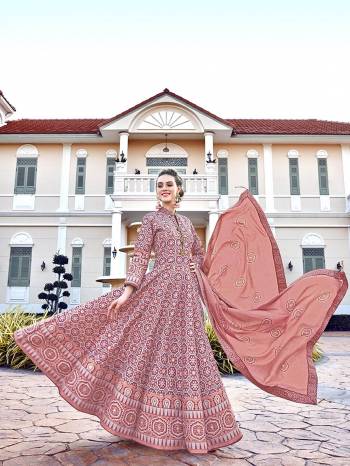 Grab This Very Beautiful Designer Readymade Suit In Dusty Pink Color. Its Lovely Printed Top Is Soft Silk Based Paired With Cotton Leggings And Soft Muslin Fabricated Dupatta. This Readymade Suit Is Beautified With Prints All Over. Also It Is Available In All Regular Sizes. Buy Now.