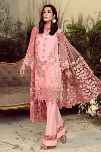 Grab This Pretty Heavy Embroidered Pakistani Designer Suit In Pink Color. Its Embroidered Top Is Georgette Based Paired With Santoon Bottom and Net Fabricated Embroidered Dupatta. 