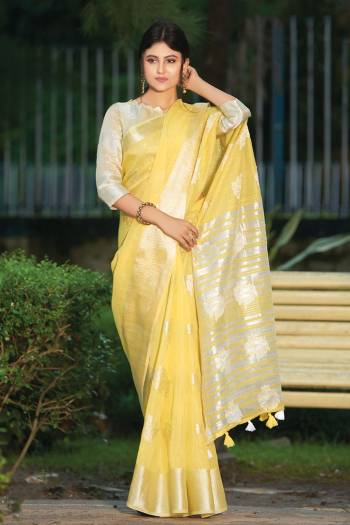 For Your Semi-Casual Or Festive Wear, Grab This Pretty Designer Saree In Yellow Color. This Saree And Blouse Are Fabricated On Linen Cotton Beautified With Weave. Buy This Elegant Looking Saree Now. 