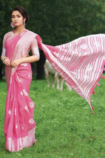 For Your Semi-Casual Or Festive Wear, Grab This Pretty Designer Saree In Pink Color. This Saree And Blouse Are Fabricated On Linen Cotton Beautified With Weave. Buy This Elegant Looking Saree Now. 