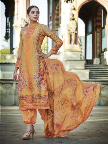 Look Pretty Wearing This Designer Straight Suit In Orange Color. Its Pretty Top And Dupatta Are Fabricated On Cotton Beautified With Digital Print And Thread Work Paired With Plain Combric cotton Fabricated Bottom. 