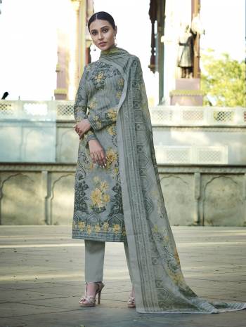 Add This Beautiful Digital Printed Designer Straight Suit In Grey Color To Your Wardrobe. This Pretty Suit Is cotton Based Beautified With Digital Print And Thread Work. Buy Now.