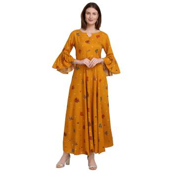 For Your Semi-Casuals, Grab This Designer Readymade Long Kurti In Musturd Yellow Color Fabricated On Rayon. It Is Beautified With Foil Prints And You Can Pair This Up With Some Accessories For A Festive Look. Buy Now.