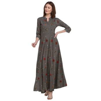 For Your Semi-Casuals, Grab This Designer Readymade Long Kurti In Grey Color Fabricated On Rayon. It Is Beautified With Foil Prints And You Can Pair This Up With Some Accessories For A Festive Look. Buy Now.