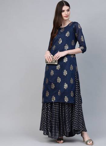 Add This Beautiful Readymade Kurti In Navy Blue Color Fabricated On Chanderi Beautified With Prints. It Is Light Weight and Available In All Regular Sizes. 