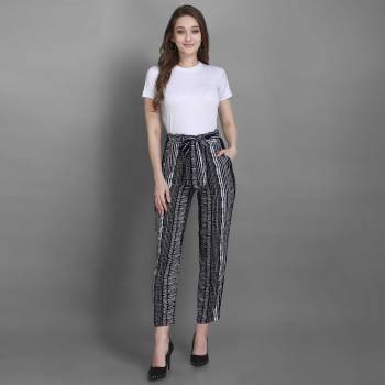 Grab This Pretty Comfortable Printed Readymade Jeggins In Black and White Color. It Is Fabricated On Rayon In Free Size With Ealsticated Waist Band. 