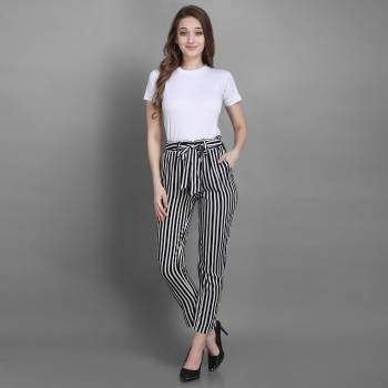 Grab This Pretty Comfortable Printed Readymade Jeggins In Black and White Color. It Is Fabricated On Rayon In Free Size With Ealsticated Waist Band. 