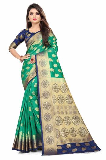 For A Proper Traditional Look, Grab This Heavy Weaved Silk Based Designer Saree In Sea Green Color Paired with Navy Blue Colored blouse. This Saree and Blouse Are Fabricated On Art Silk Which Gives A Rich Look To Your Personality. 