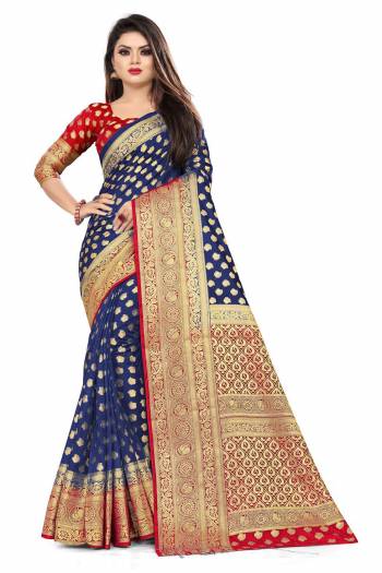 For A Proper Traditional Look, Grab This Heavy Weaved Silk Based Designer Saree In Navy Blue Color Paired with Red Colored blouse. This Saree and Blouse Are Fabricated On Art Silk Which Gives A Rich Look To Your Personality. 