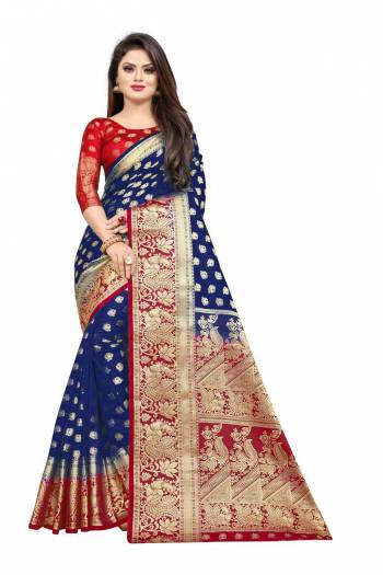 For A Proper Traditional Look, Grab This Heavy Weaved Silk Based Designer Saree In Navy Blue Color Paired with Red Colored blouse. This Saree and Blouse Are Fabricated On Art Silk Which Gives A Rich Look To Your Personality. 