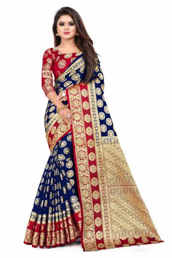 For A Proper Traditional Look, Grab This Heavy Weaved Silk Based Designer Saree In Navy Blue Color Paired with Red Colored blouse. This Saree and Blouse Are Fabricated On Art Silk Which Gives A Rich Look To Your Personality. 