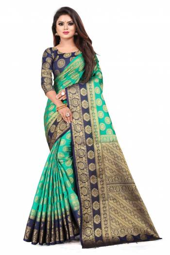 For A Proper Traditional Look, Grab This Heavy Weaved Silk Based Designer Saree In Sea Green Color Paired with Navy Blue Colored blouse. This Saree and Blouse Are Fabricated On Art Silk Which Gives A Rich Look To Your Personality. 