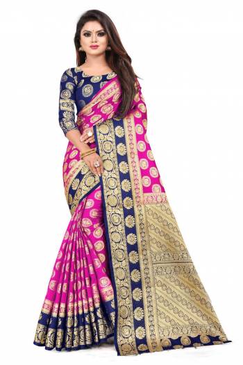 For A Proper Traditional Look, Grab This Heavy Weaved Silk Based Designer Saree In Rani Pink Color Paired with Navy Blue Colored blouse. This Saree and Blouse Are Fabricated On Art Silk Which Gives A Rich Look To Your Personality. 