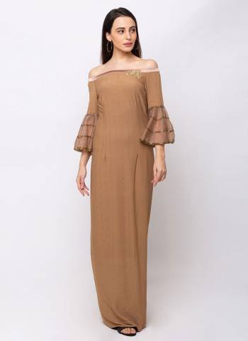 Flaunt Your Rich And Elegant Taste Wearing This Designer Readymade Gown In Beige Color. This Pretty Gown Has Elegant Off Shoulder Pattern. Its Rich Color And Fabric Will Definitely Earn You Lots Of Compliments From Onlookers. 