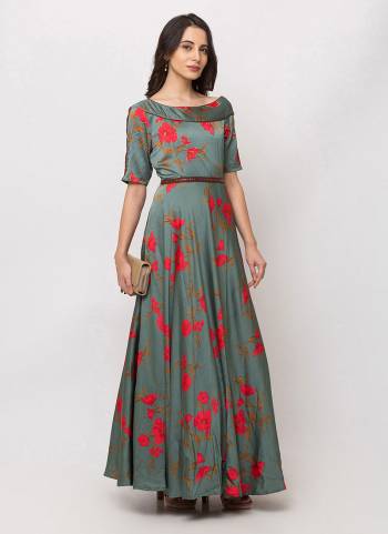 Celebrate This Festive Season Wearing This Designer Readymade Floor Length Gown In Steel Blue Color Fabricated On Satin. This Pretty Gown Is Beautified With Floral Prints Giving A Pretty Look. 