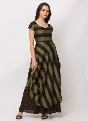 Here Is A Lovely Striped Patterned  Designer Readymade Gown In Olive Green and Black Color. This Pretty Gown Is Fabricated On Crepe Satin And Is Suitable For Festive Or Party Wear. 