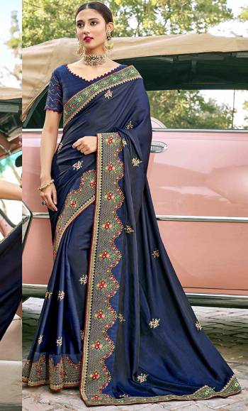 Celebrate This Festive Season In This Very Navy Blue Colored Saree Paired with Navy Blue Blouse. This Saree and Blouse Are Silk Based Beautified With Detailed Embroidery. 